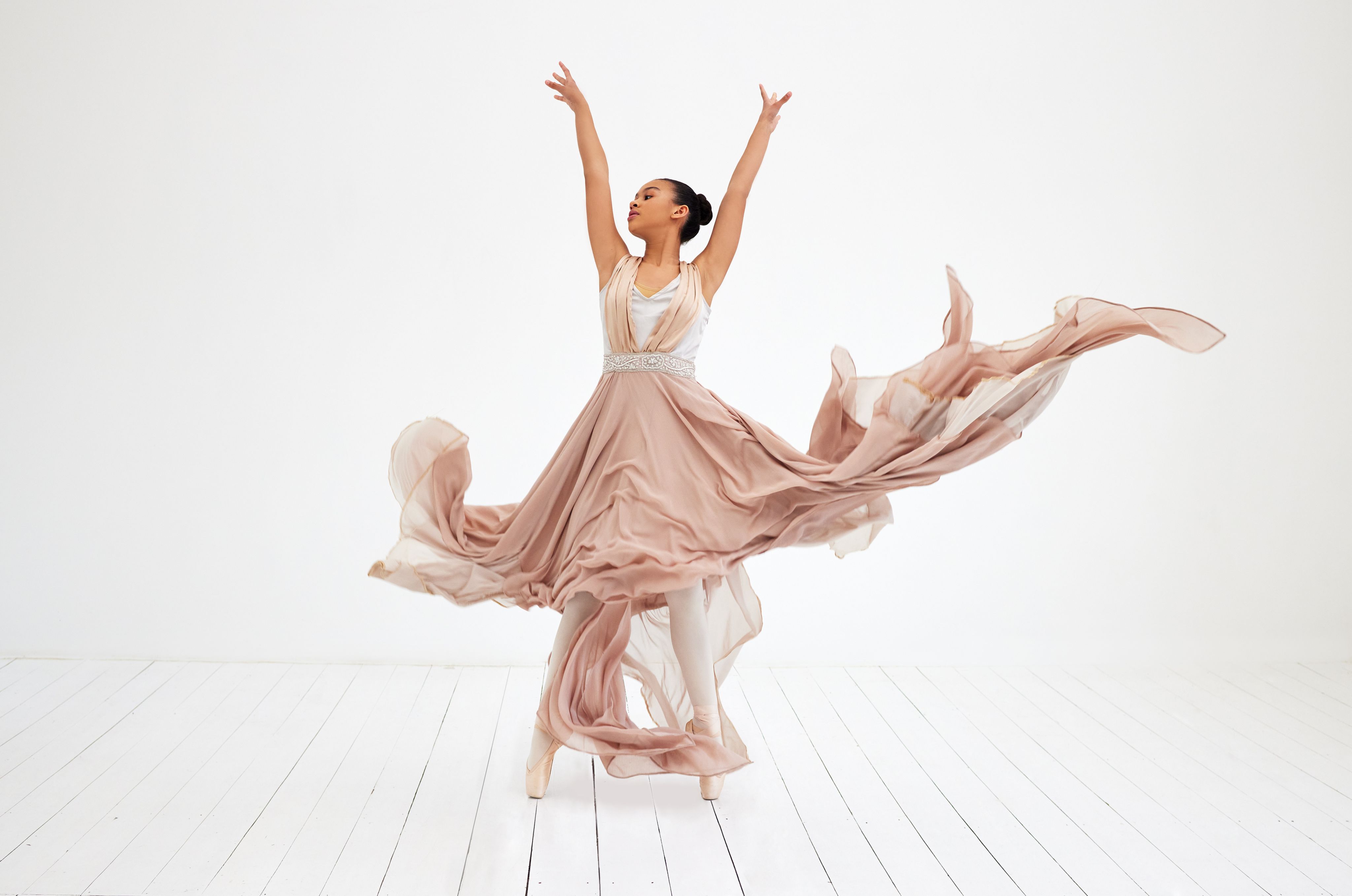 woman in red dress dancing